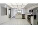 The kitchen has stainless steel appliances and a view of the backyard at 802 Magnolia Pl, Winter Haven, FL 33884