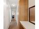 Hallway with view into bedroom and bathroom at 1631 Monterey Ln, Lakeland, FL 33813