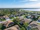 Single-story house with a lake view, aerial view at 4076 Tralee Dr, Lake Wales, FL 33859
