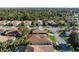 Single-story house on a quiet street, aerial view at 4076 Tralee Dr, Lake Wales, FL 33859