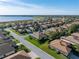 Single story house near a lake, aerial view at 4076 Tralee Dr, Lake Wales, FL 33859