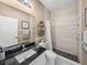 Bathroom with single vanity, shower, and toilet at 4076 Tralee Dr, Lake Wales, FL 33859