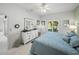 Bright bedroom with a large bed, dresser, and plenty of natural light at 4076 Tralee Dr, Lake Wales, FL 33859