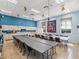 Community craft room with long tables and chairs at 4076 Tralee Dr, Lake Wales, FL 33859