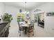 Charming dining area with a round table and four chairs at 4076 Tralee Dr, Lake Wales, FL 33859