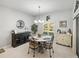 Elegant dining room with round table and four chairs at 4076 Tralee Dr, Lake Wales, FL 33859