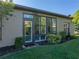Exterior view of house with a well-manicured lawn at 4076 Tralee Dr, Lake Wales, FL 33859