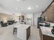 Modern kitchen with stainless steel appliances and an island at 4076 Tralee Dr, Lake Wales, FL 33859