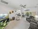 Open living space with a view into the dining area and kitchen at 4076 Tralee Dr, Lake Wales, FL 33859