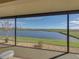 Serene water views from the screened lanai at 4089 Dunmore Dr, Lake Wales, FL 33859