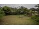 Large backyard with mature landscaping at 6102 N Fork Ct, Lakeland, FL 33809