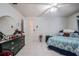 Primary bedroom with a double bed and dresser at 6102 N Fork Ct, Lakeland, FL 33809