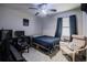 Spacious bedroom with a desk and chair at 6102 N Fork Ct, Lakeland, FL 33809