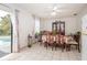 Dining room with table, chairs, and access to the pool at 6102 N Fork Ct, Lakeland, FL 33809