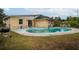 Large kidney shaped pool and patio at 6102 N Fork Ct, Lakeland, FL 33809