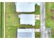 Aerial view showing single-wide mobile home with yard at 6308 Bayberry Ne Blvd, Winter Haven, FL 33881