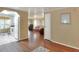 Hardwood floors and view into the living room and kitchen at 6308 Bayberry Ne Blvd, Winter Haven, FL 33881