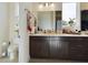 Modern bathroom featuring a double vanity and toilet at 727 Annabell Ridge Rd, Minneola, FL 34715