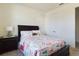 Cozy bedroom with double bed and wooden furniture at 727 Annabell Ridge Rd, Minneola, FL 34715