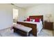 Main bedroom with king-size bed and ensuite access at 727 Annabell Ridge Rd, Minneola, FL 34715