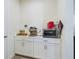 Well-equipped coffee bar with espresso machine and toaster oven at 727 Annabell Ridge Rd, Minneola, FL 34715