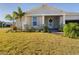 Inviting front porch and nicely landscaped yard at 727 Annabell Ridge Rd, Minneola, FL 34715