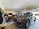 Attached garage with space for one car and storage at 727 Annabell Ridge Rd, Minneola, FL 34715