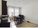 Home office with large desk and built-in shelving at 727 Annabell Ridge Rd, Minneola, FL 34715