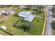 Aerial view showing home's spacious yard and location on a quiet street at 8460 Plantation Ridge Blvd, Lakeland, FL 33809