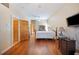 Main bedroom with hardwood floors and large windows at 8460 Plantation Ridge Blvd, Lakeland, FL 33809