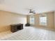 Bright bedroom with tile floors and large windows at 111 Woden Way, Winter Haven, FL 33884