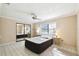 Bedroom with sliding mirrored closet doors at 111 Woden Way, Winter Haven, FL 33884