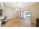 Bright dining room with sliding doors leading to patio at 111 Woden Way, Winter Haven, FL 33884