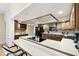 Kitchen with breakfast bar and ample wood cabinets at 111 Woden Way, Winter Haven, FL 33884