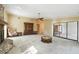 Spacious living room featuring a fireplace and built-in shelving at 111 Woden Way, Winter Haven, FL 33884