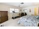 Bedroom with king bed, exercise equipment, and ample closet space at 1117 N Lakeshore Blvd, Lake Wales, FL 33853