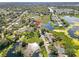 Aerial view showing home's location near lake at 1143 Waterview Pt, Lakeland, FL 33801