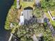 Bird's-eye view of a house near a lake at 1143 Waterview Pt, Lakeland, FL 33801