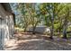 Large backyard with mature trees and side yard at 1143 Waterview Pt, Lakeland, FL 33801