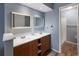 Double vanity bathroom with access to shower at 1143 Waterview Pt, Lakeland, FL 33801