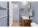 Small bathroom with vanity and access to another room at 1143 Waterview Pt, Lakeland, FL 33801