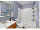 Clean bathroom with a tub, toilet and vanity at 1143 Waterview Pt, Lakeland, FL 33801