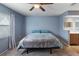 Main bedroom with king bed and access to bathroom at 1143 Waterview Pt, Lakeland, FL 33801