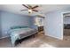 Main bedroom with king bed and access to bathroom at 1143 Waterview Pt, Lakeland, FL 33801