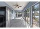 Bright Florida room with sliding glass doors and lake view at 1143 Waterview Pt, Lakeland, FL 33801