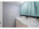 Bright laundry room with side-by-side washer and dryer at 1143 Waterview Pt, Lakeland, FL 33801