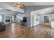 Open living room and kitchen with hardwood floors and high ceilings at 1143 Waterview Pt, Lakeland, FL 33801