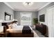 Spacious bedroom featuring a king-size bed and built-in dresser at 115 7Th Jpv St, Winter Haven, FL 33880