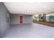 Covered carport provides parking and extra space at 115 7Th Jpv St, Winter Haven, FL 33880
