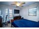 Bedroom with a double bed, dresser, and ceiling fan at 1329 Mount Pisgah Rd, Fort Meade, FL 33841